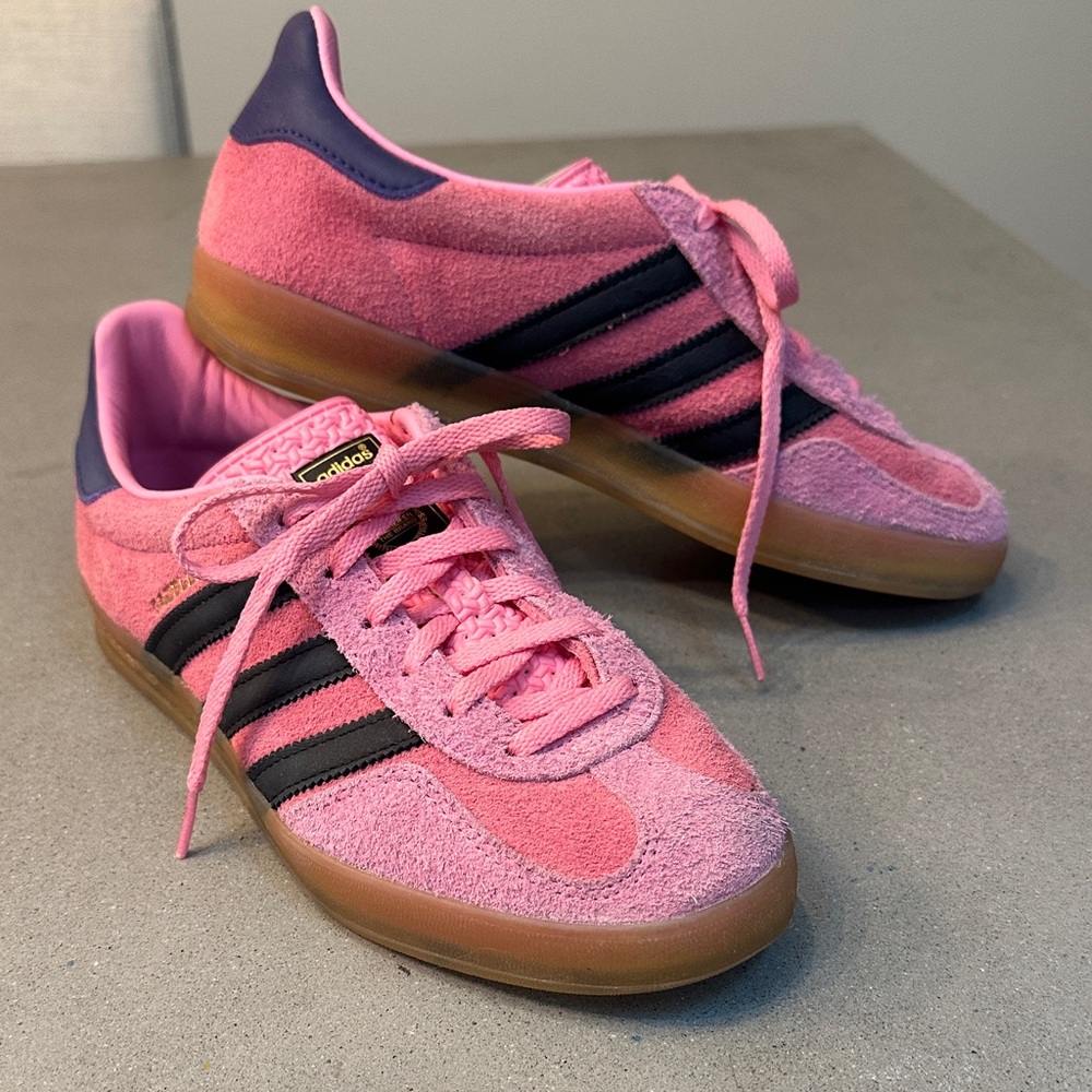 Adidas gazelle’s. Pink suede, navy stripes with purple heel detail gum sole.